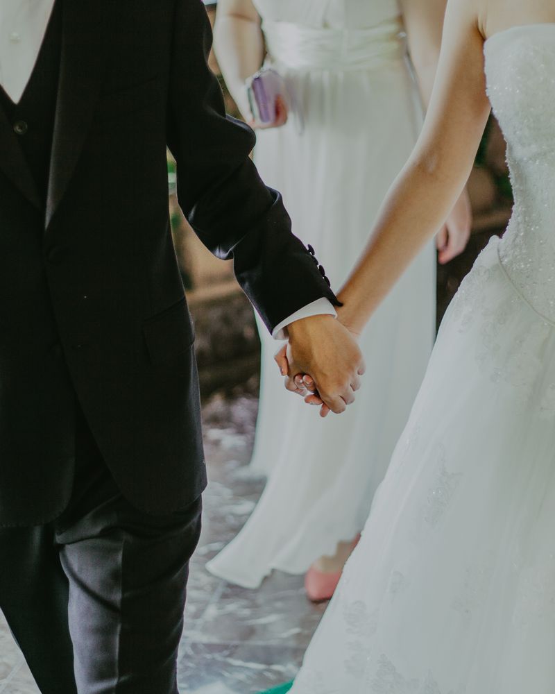 Couple holding hands